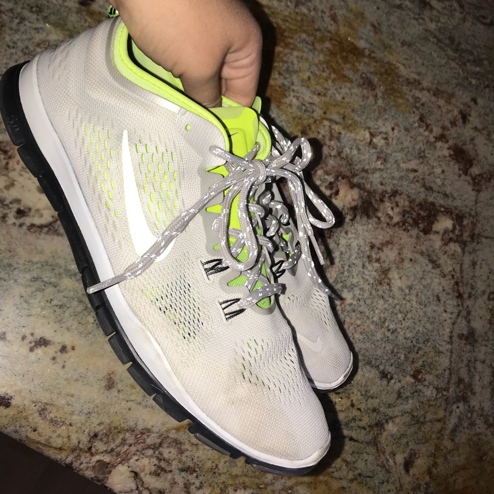 White and neon yellow Nike Free Tru Fit 4